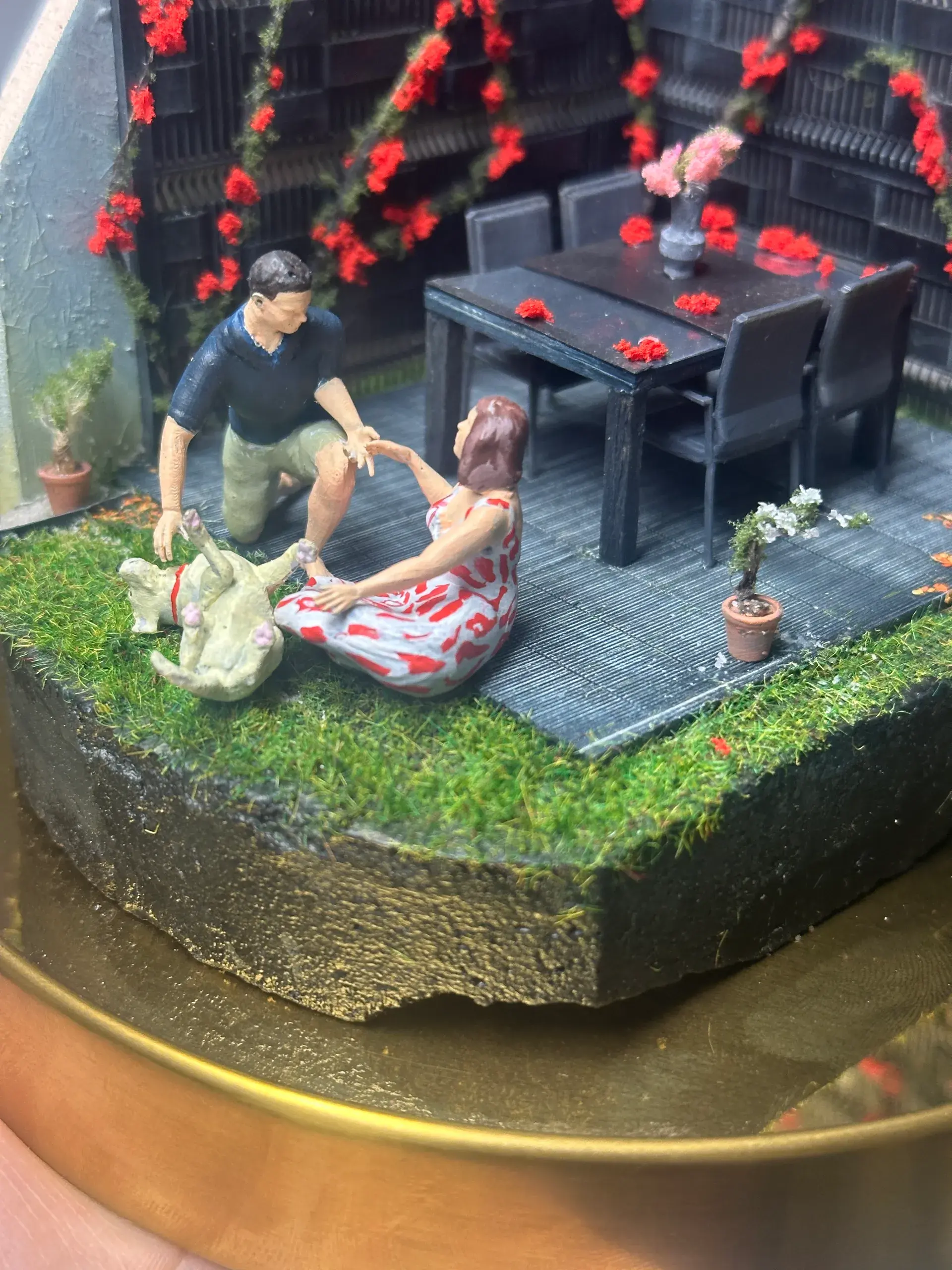 A couple and their dog in their own garden, photo 1 of 8