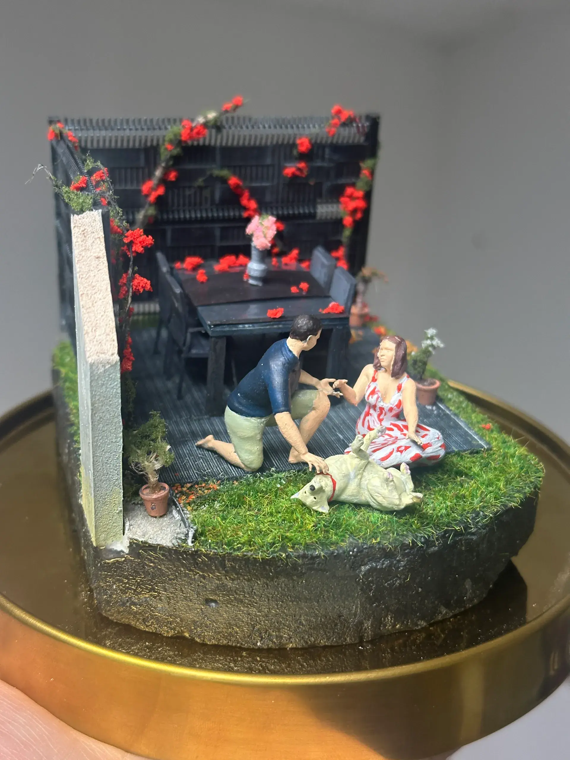 A couple and their dog in their own garden, photo 2 of 8